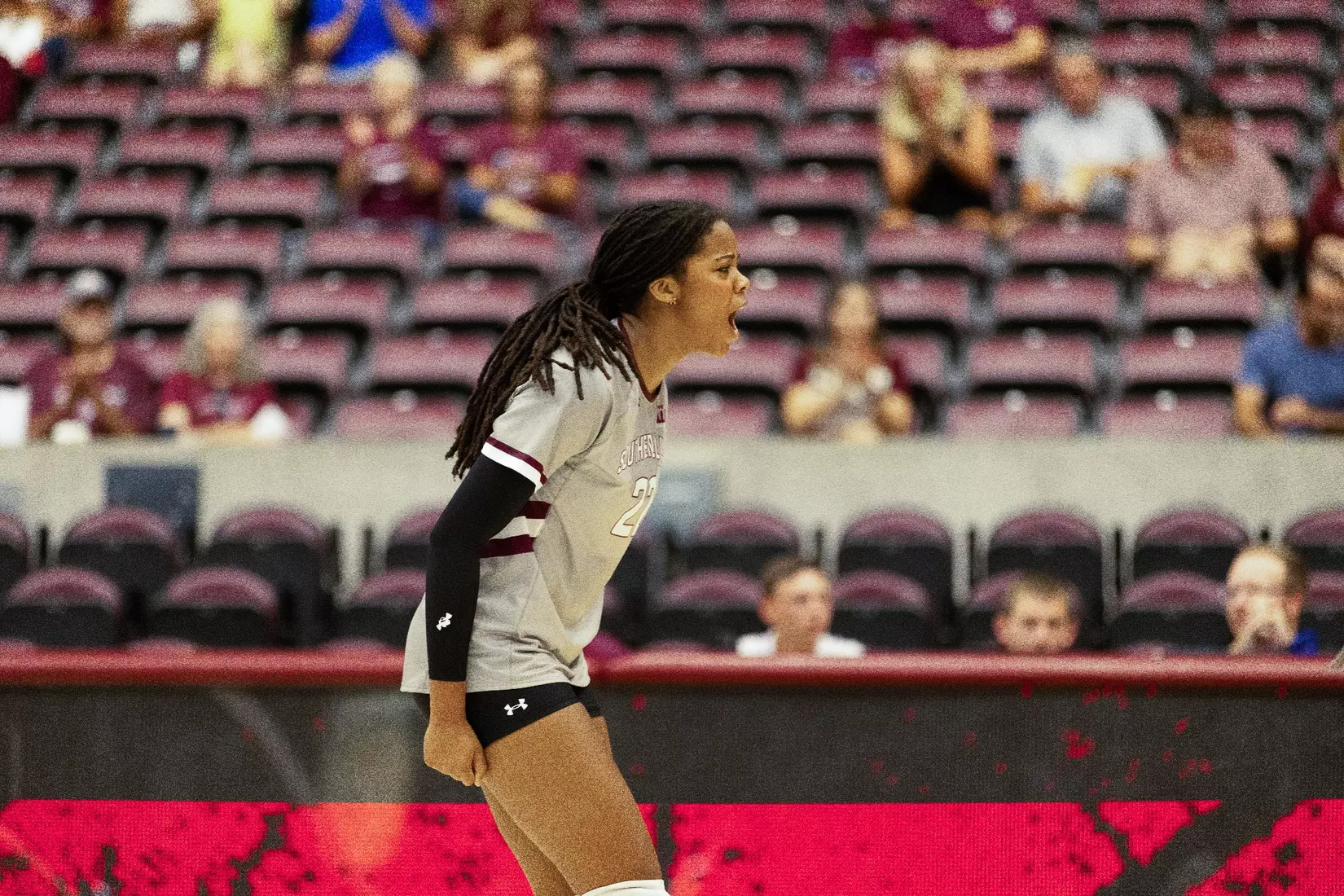 Chloe Anderson screams in excitement after a point.