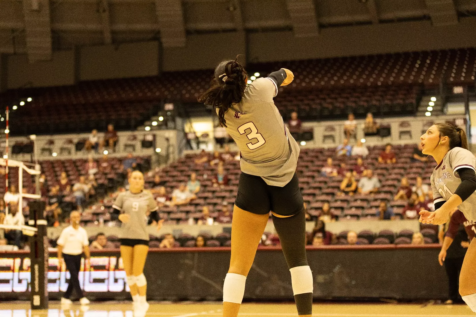 McKenzie Moeller bumps a ball.