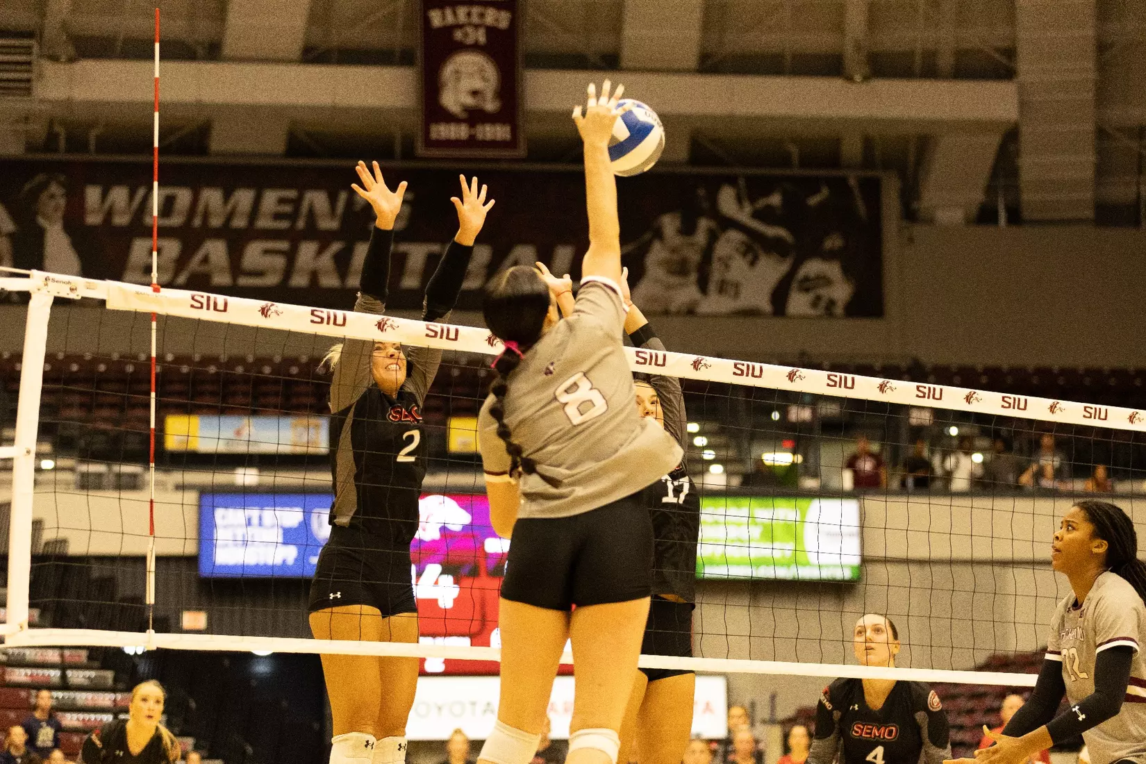 Alexandria Arrington attacks a ball for the final point of the match.