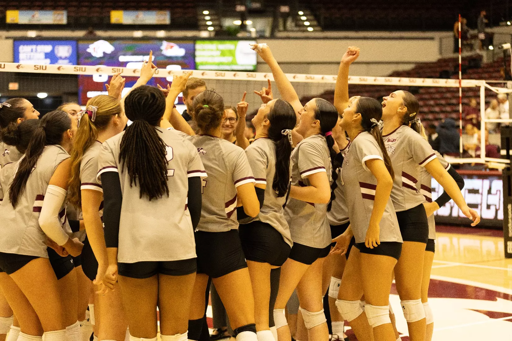 The team breaks down the huddle after the victory.