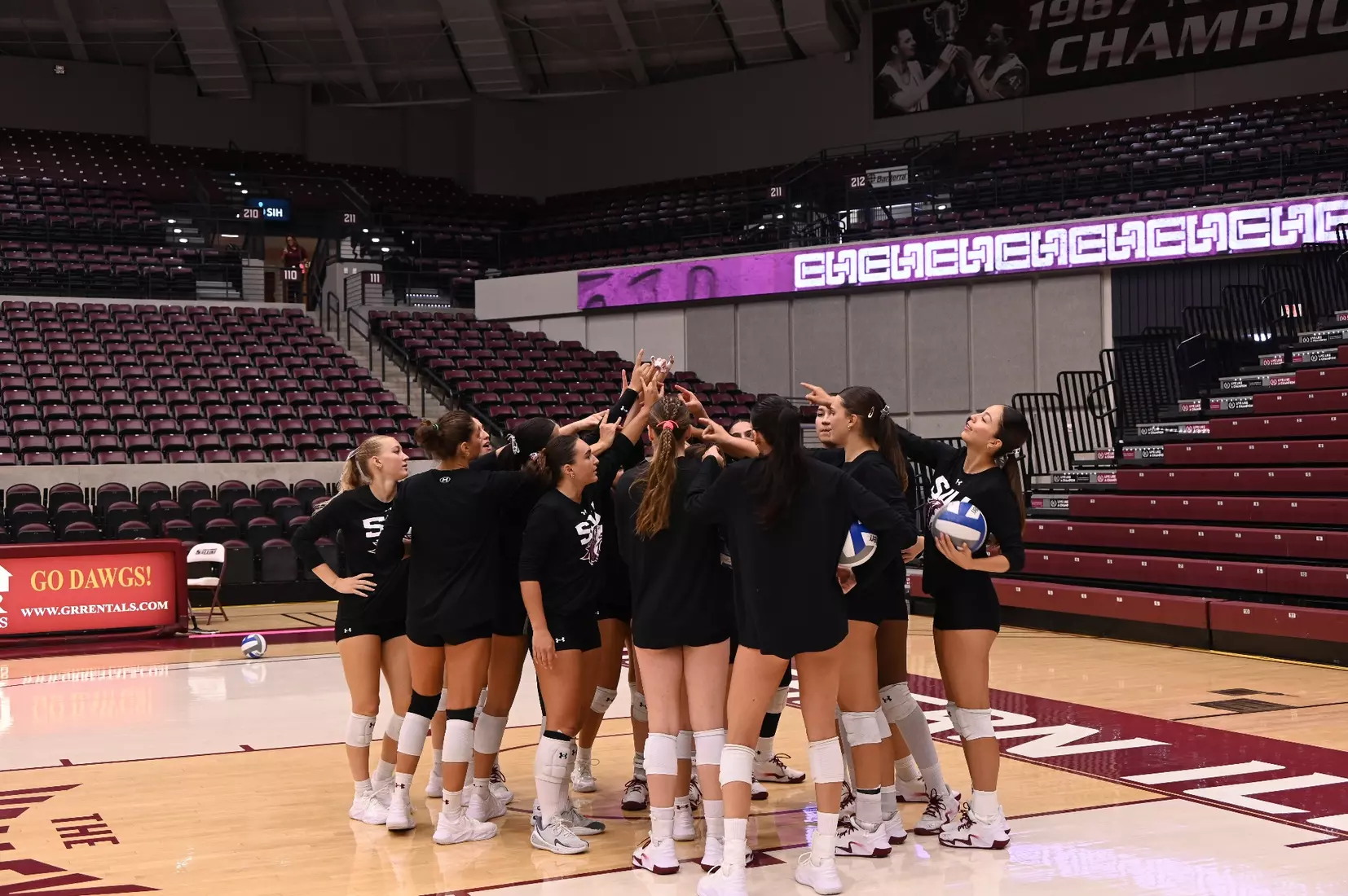 The team breaks down a huddle during warmups.