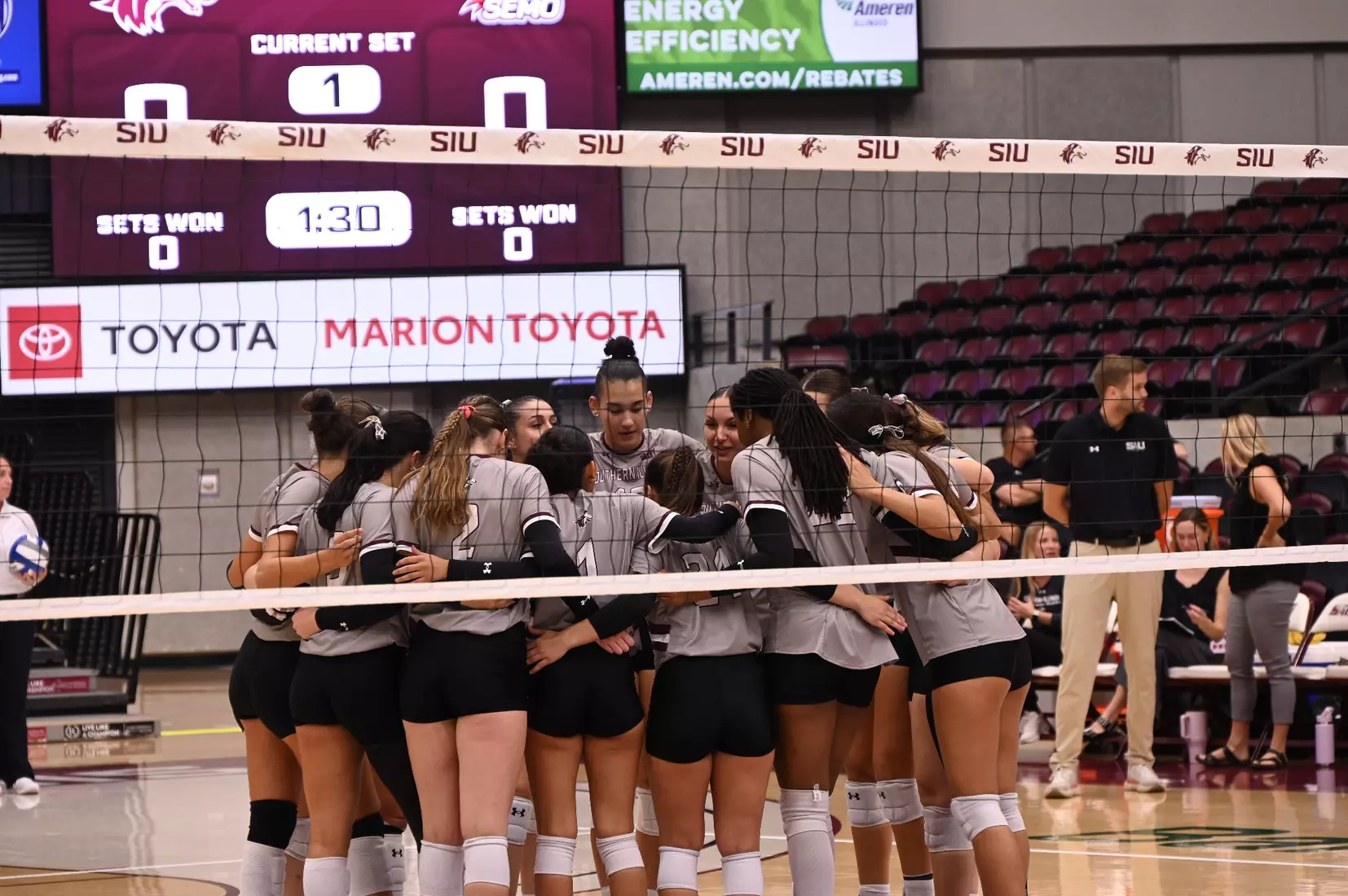 The team huddles right before the match.