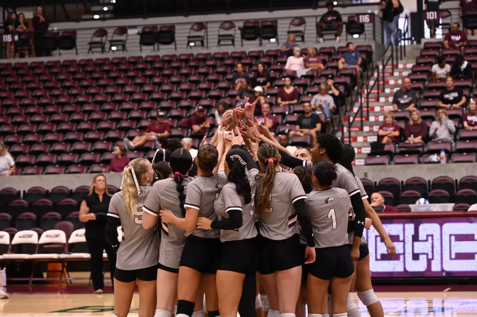 The team breaks down the final pregame huddle.