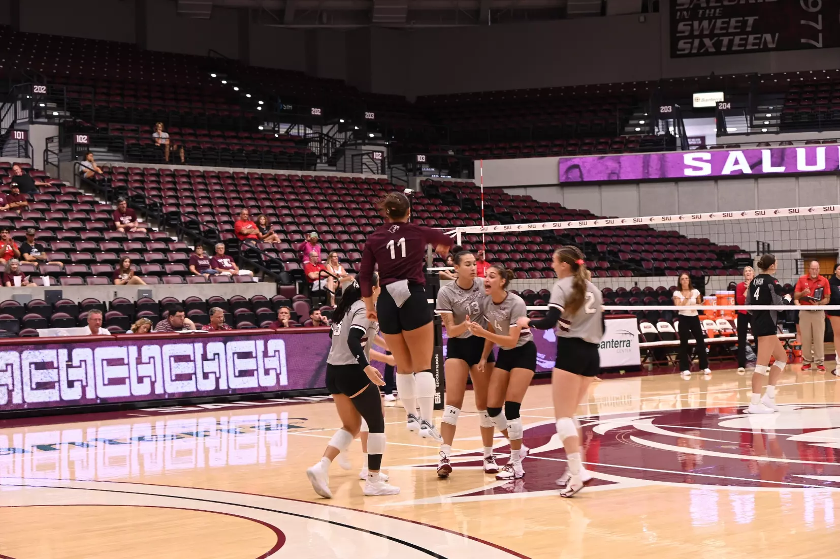 The team celebrates after a point.