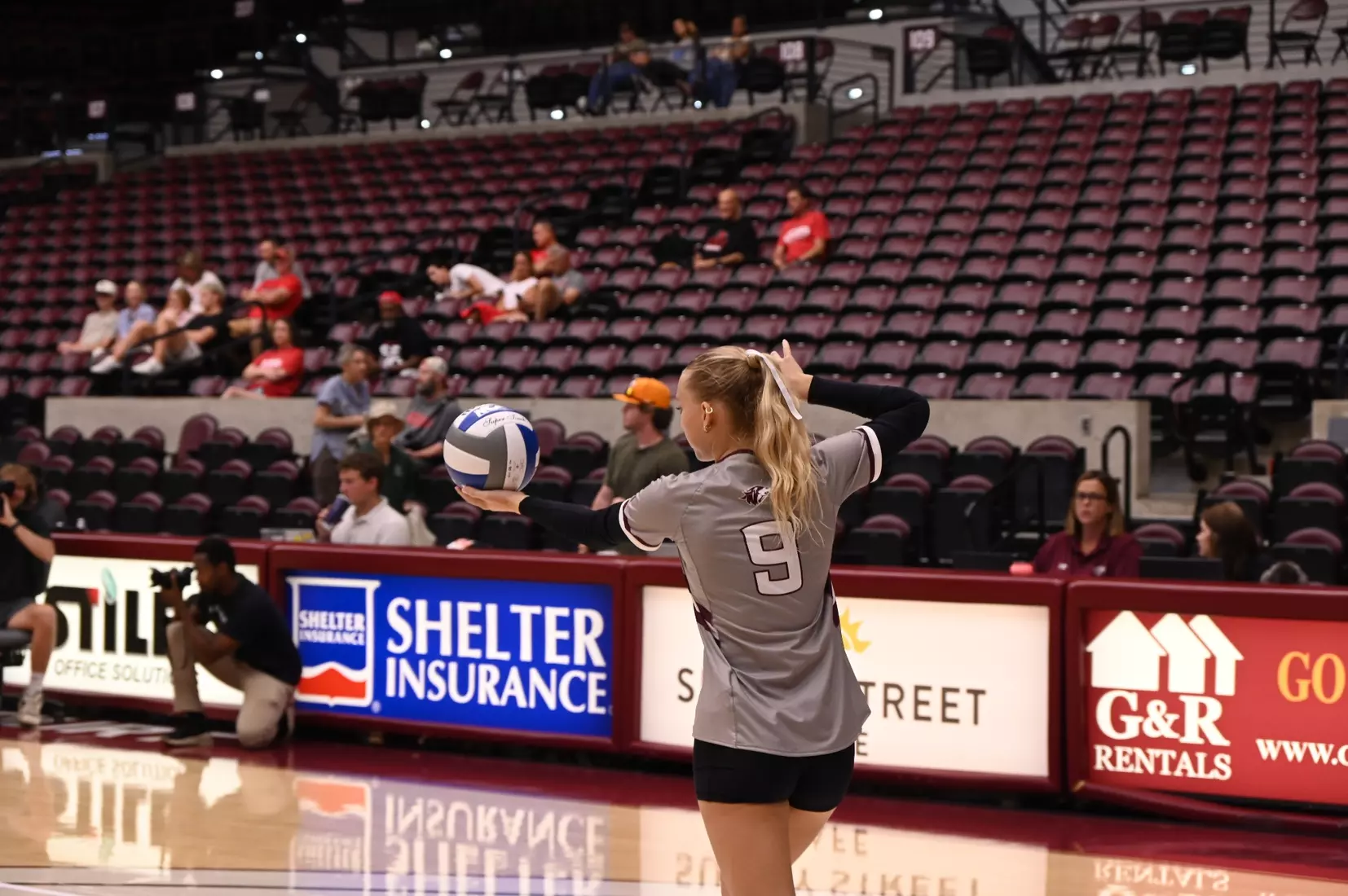 Lillian Dempkey prepares for her serve.