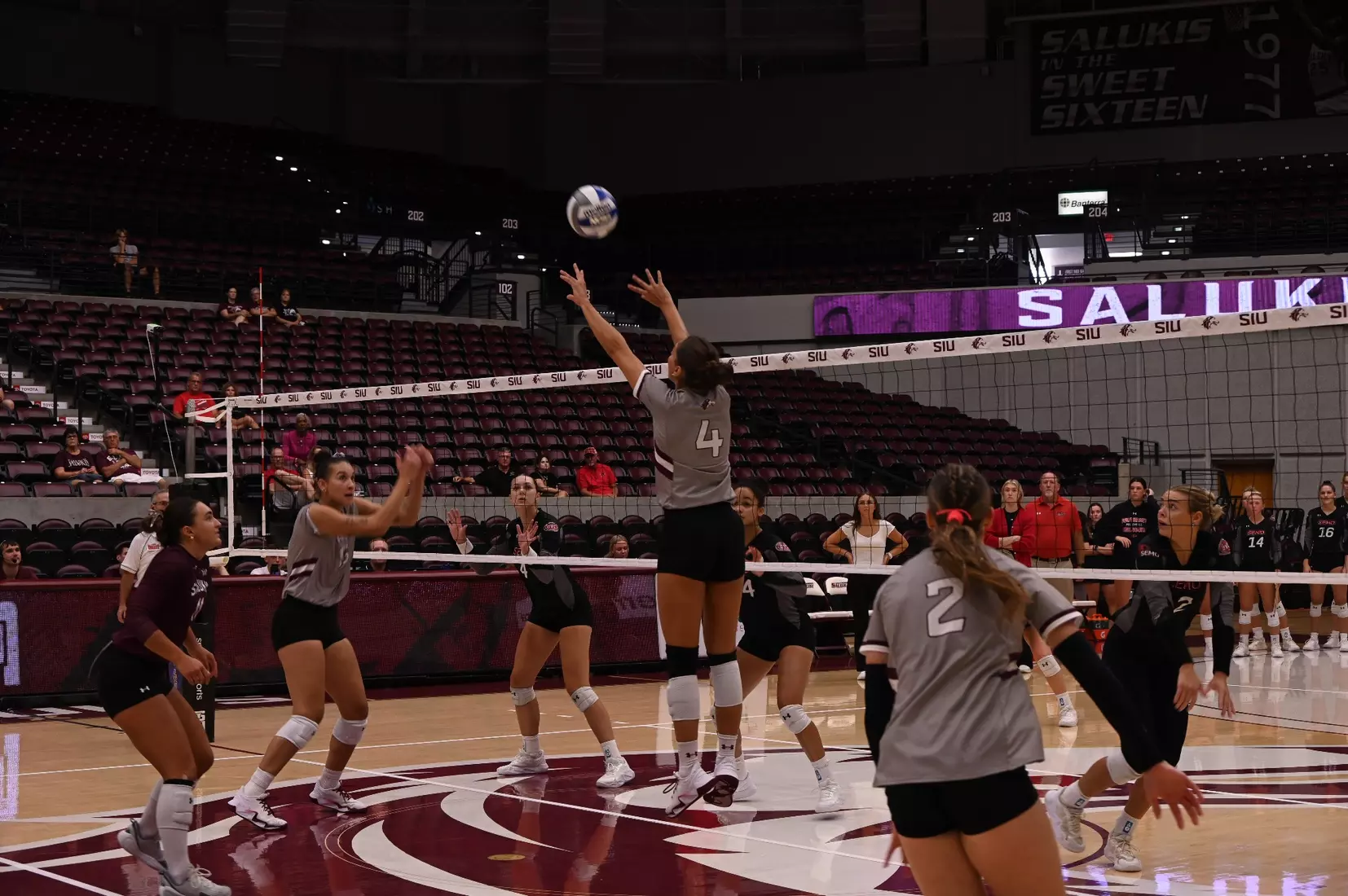Ella McFarland sets a ball in the match.