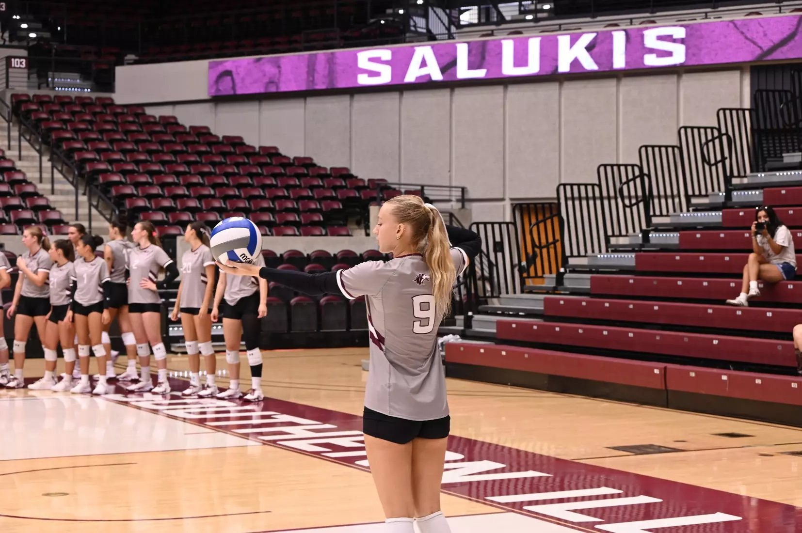 Lillian Dempkey prepares for a serve.