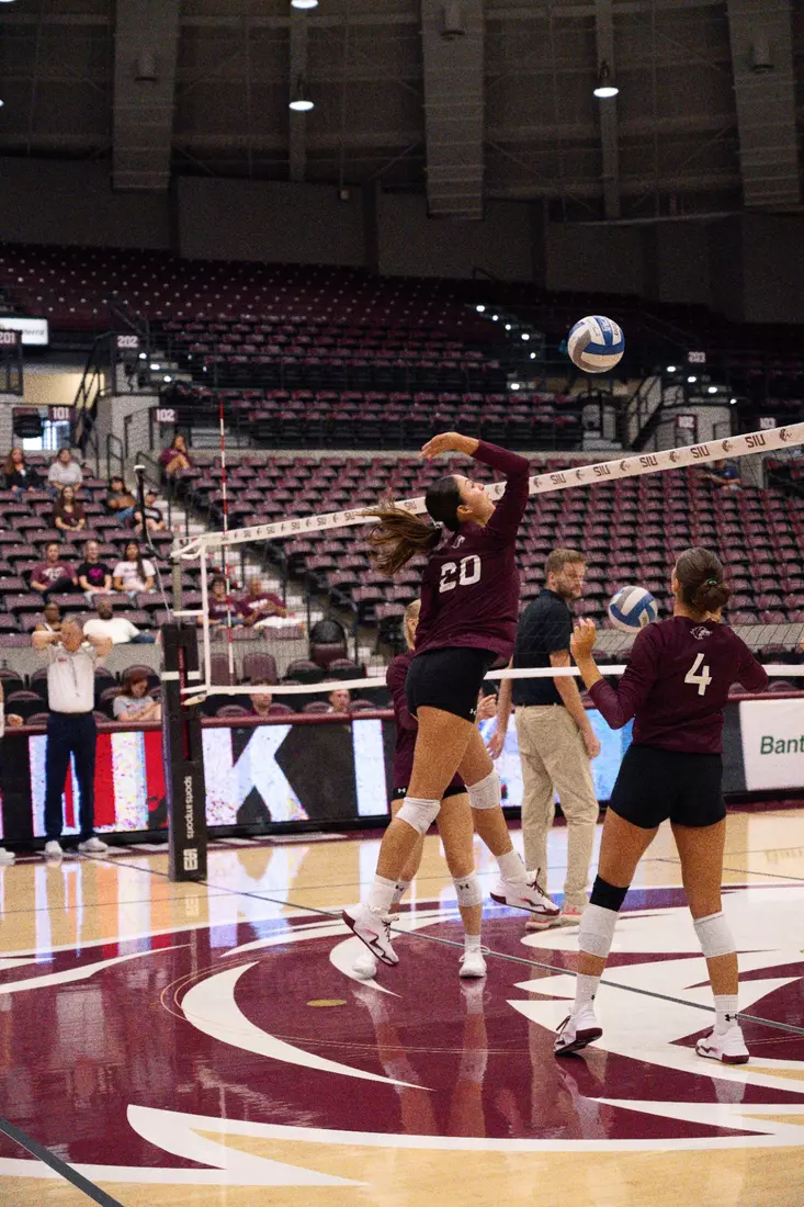 Valentina Zevallos spikes a ball in warmups.