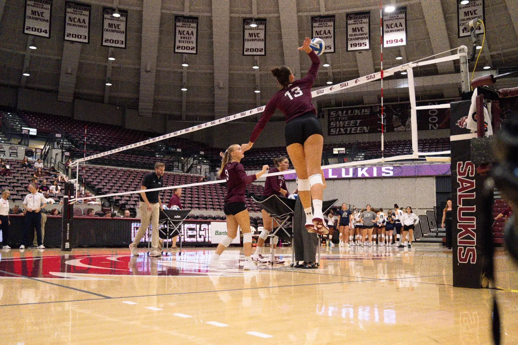 Beatriz Piaia spikes a ball in warmups.