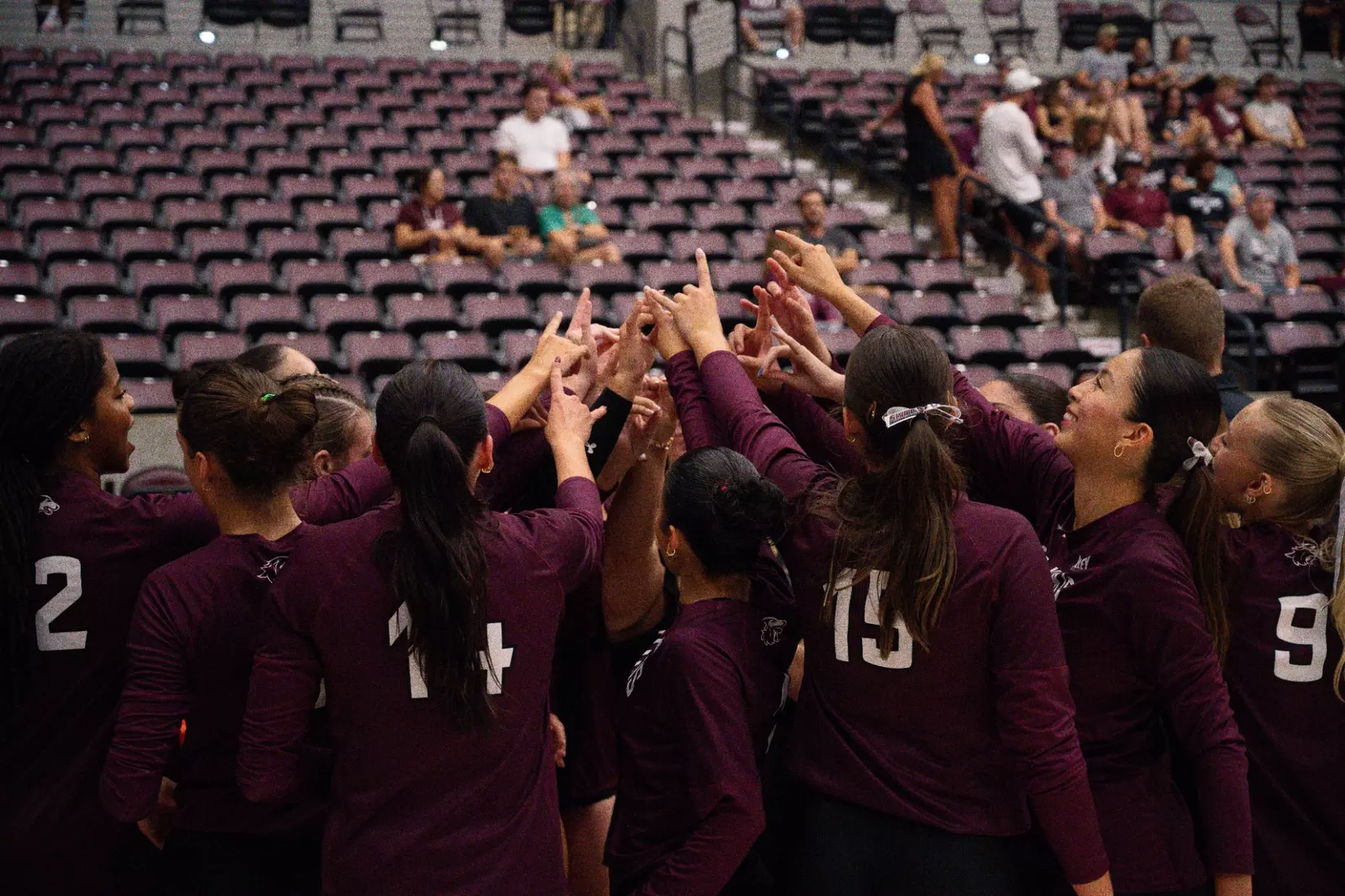 The team breaks down a huddle in warmups.