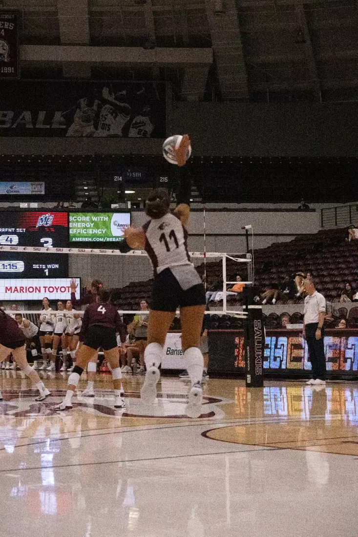 Jillian Shaneyfelt serves a ball.