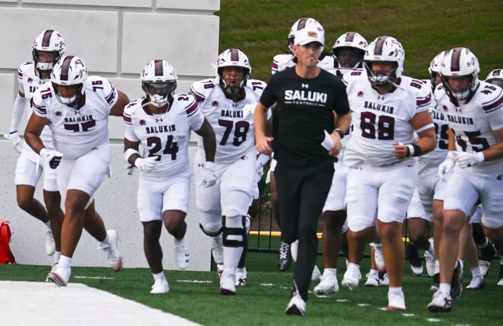 Team running onto the field