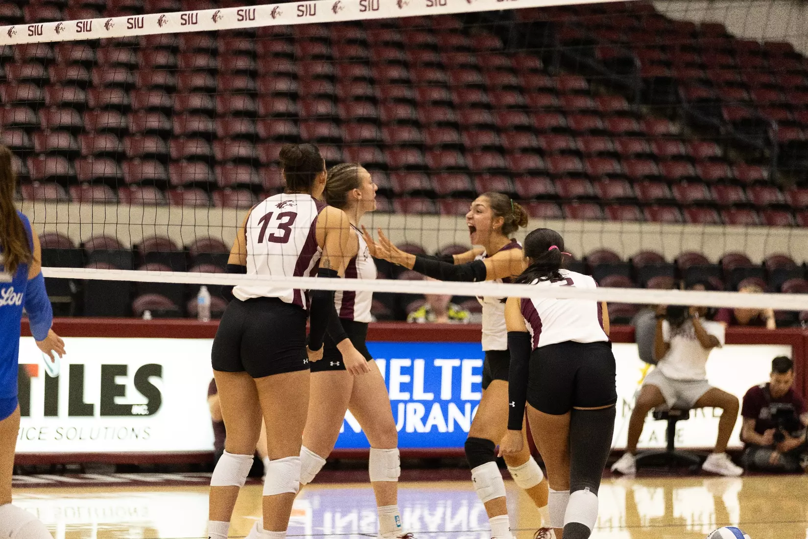The team celebrates after a point.