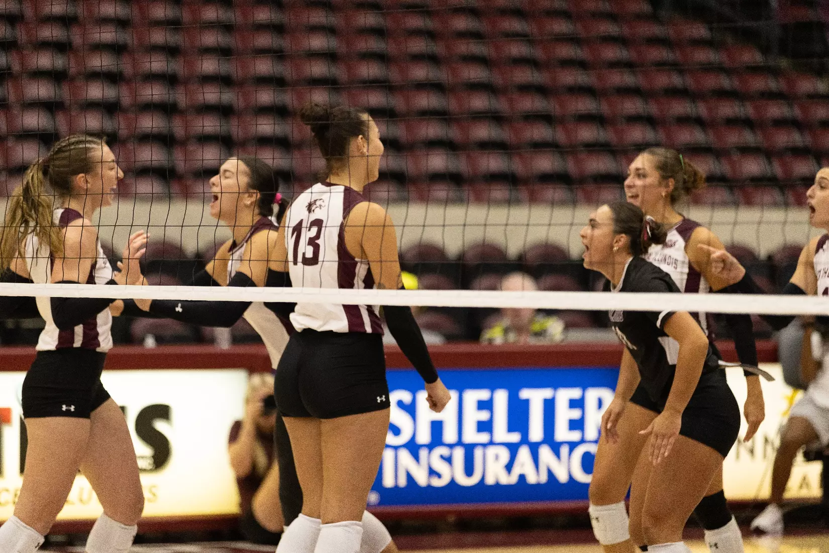 The team celebrates after a point.