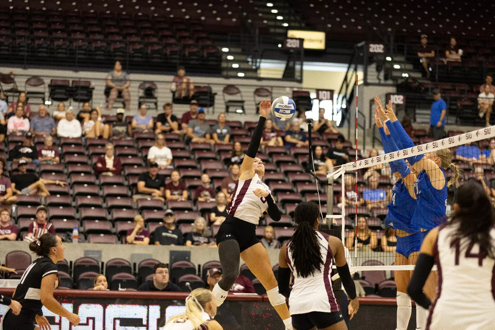 McKenzie Moeller smacks a ball midair.
