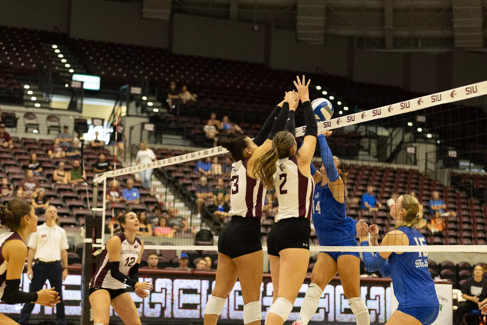 Beatriz Piaia and Natalie Vance block an incoming attack.
