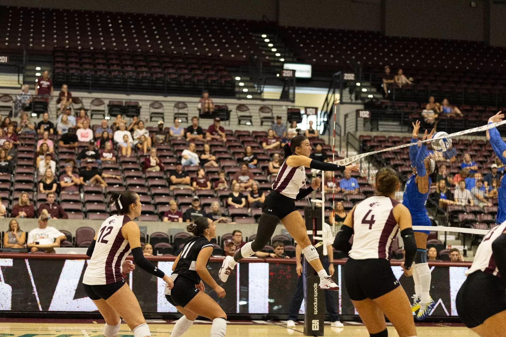 McKenzie Moeller follows through on her attack.