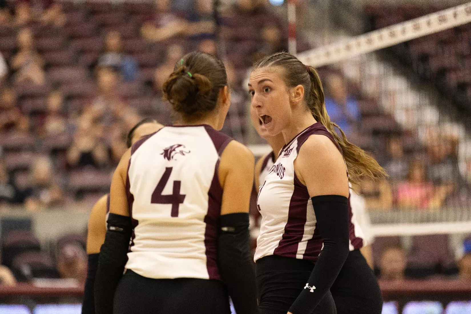 Natalie Vance looks at Ella McFarland with intensity and excitement after a point.