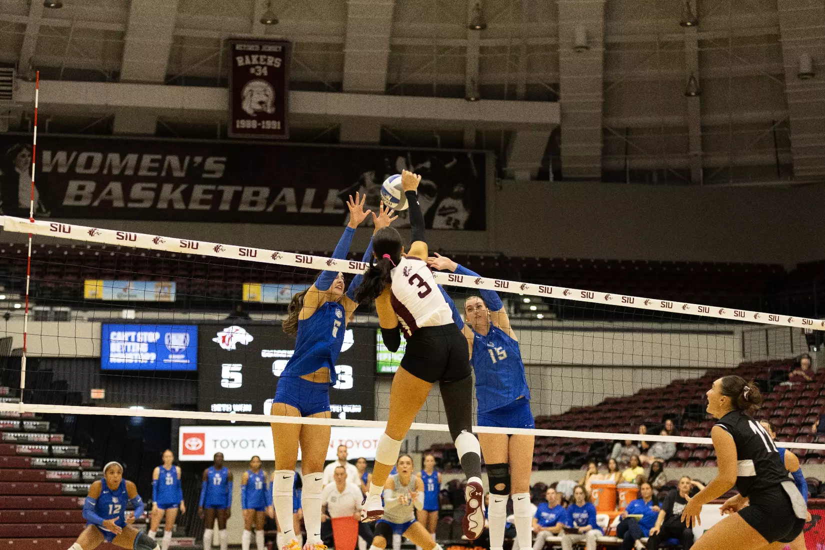 McKenzie Moeller attacks a ball.