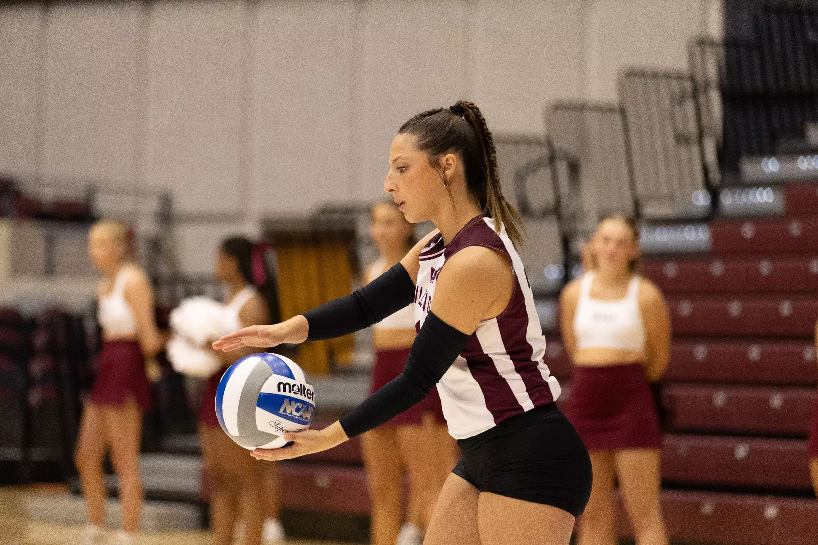 Isabella Del Real prepares for her serve.