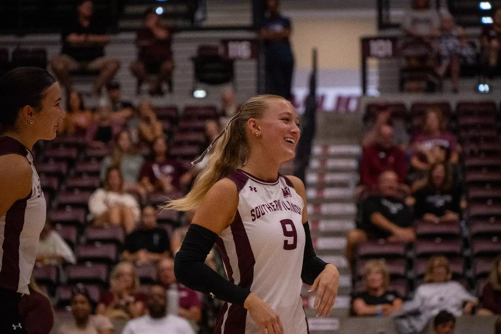 Lillian Dempkey smiles after a point.