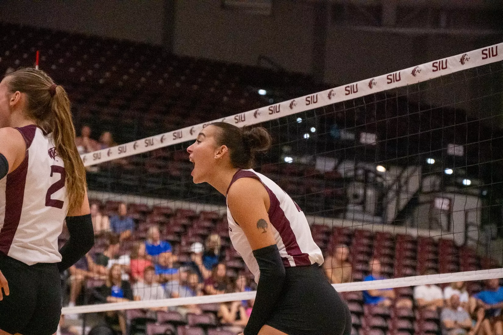 Beatriz Piaia screams in celebration after a point.