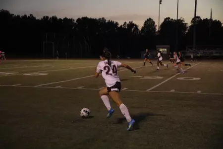 Celina Pinelli runs toward the ball during a night soccer match against Lindenwood