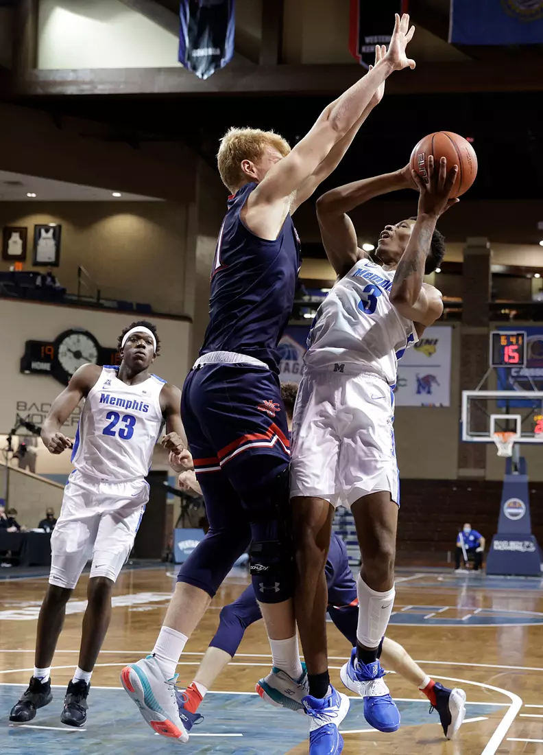 Landers Nolley II #3 of the Memphis Tigers takes the ball to the basket against Matthias Tass #11 of the St. Mary's Gaels during the Bad Boy Mowers Crossover Classic at the Sanford Pentagon in Sioux Falls, SD. (Photo by Richard Carlson/Inertia)