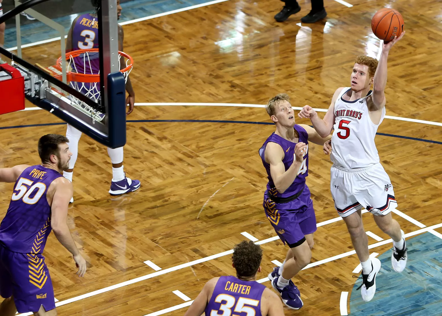 Jabe Mullins #5 of the St. Mary's Gaels shoots against thee defense from the Northern Iowa Panthers during the Bad Boy Mowers Crossover Classic at the Sanford Pentagon in Sioux Falls, SD. (Photo by Dave Eggen/Inertia)