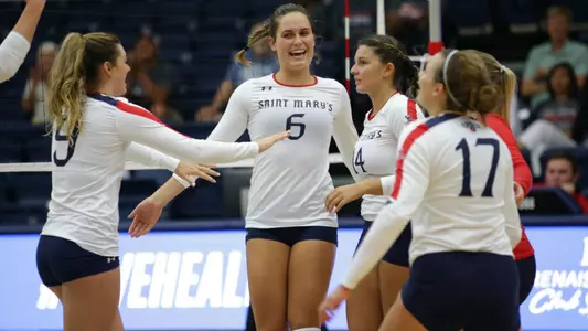 Sienna Young (center) set a new career high Tuesday with 16 kills.