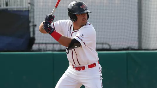 Kevin Milam had three hits Saturday to go with six innings and eight strikeouts on the mound.