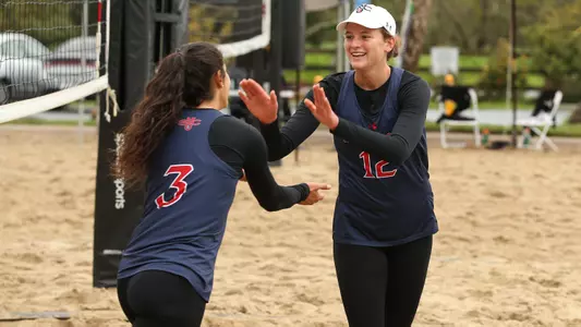 Emily Bible (left) and Lindsey Knudsen (right) went 2-0 Thursday at No. 2 pairs.