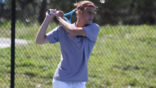 Damon Kesaris rallying on Senior Day against San Diego.