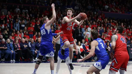 Alex Ducas goes for layup against BYU