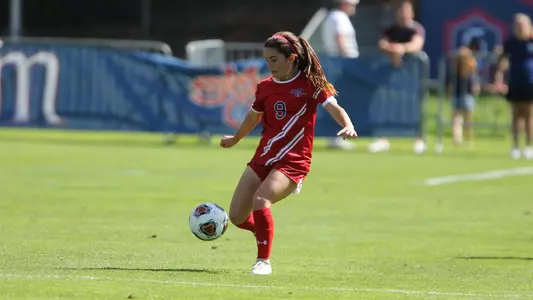 Isabella Santavicca dribbles upfield
