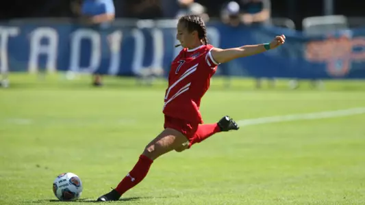 Malia Allison winds up for a big kick