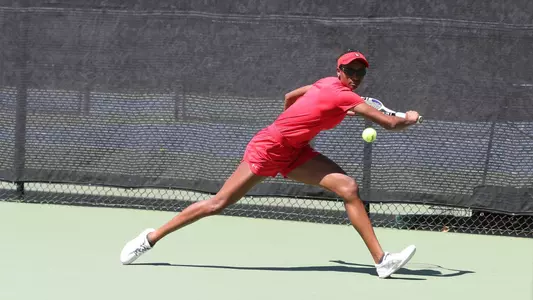 Jordan Harris stretches out for a backhand