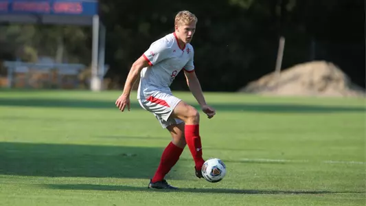 Andre Hoglin flips the ball on his foot before dribbling upfield