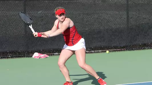 Jocelyn Massy ready swing on the foreward