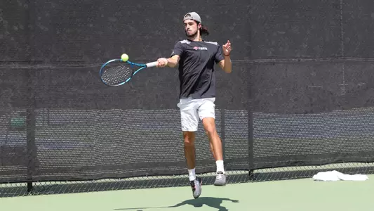Caelan Potts with a leaping swing
