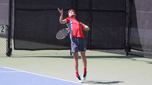 Boris Reckow winds up for a serve