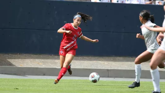 DiGeronimo gets around the corner on two defenders