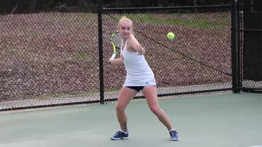 Kozyreva with a big forehand swing