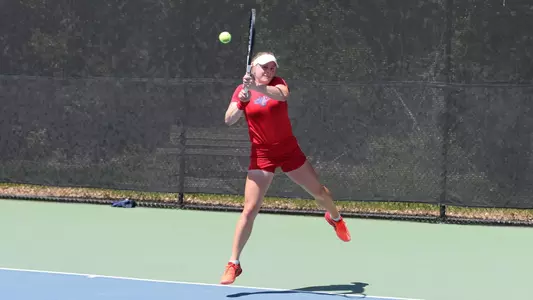 Massey leaping backhand
