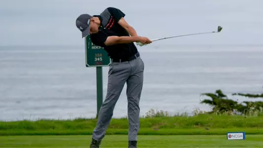 Michael Slesinski drives a shot from the tee