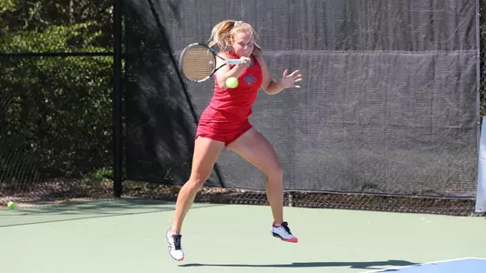 Lene Mari Hovda leaps up on a forehand swing