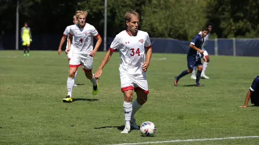 Matthias Kuhn and Andre Hoglin work their way upfield
