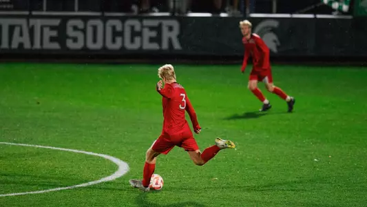 Bastian Toelhoej tees up a free kick at Michigan State