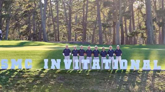 Golf team behind SMC Invitational sign in 2021