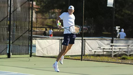 Diego Jarry leaping backhand shot